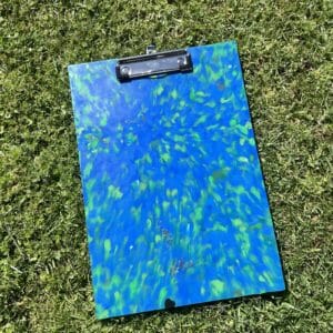 recycled plastic clipboard on grass angle