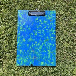 recycled plastic clipboard on grass